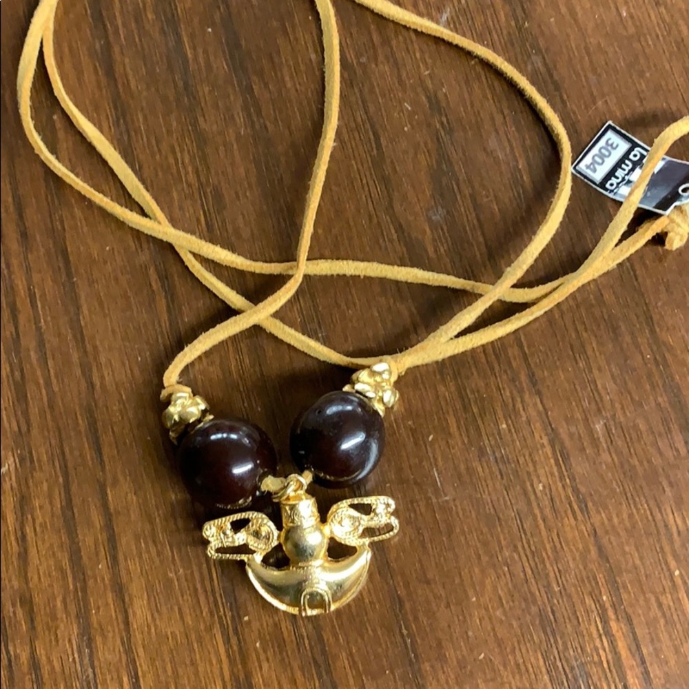 Chord and brass necklace